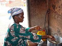 Host mother cooking jolof rice Host mother cooking jolof rice