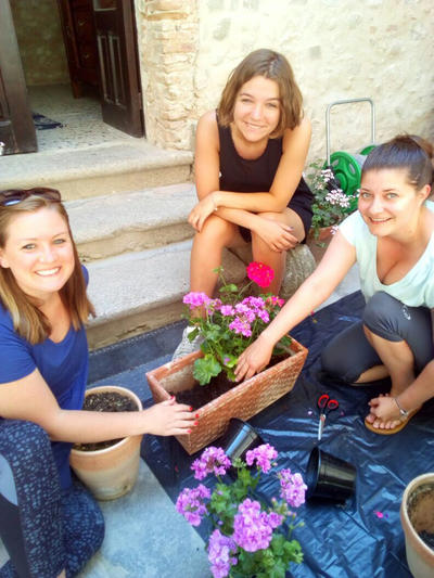 Volunteers doing gardening at the Refugee Project Volunteers doing gardening at the Refugee Project