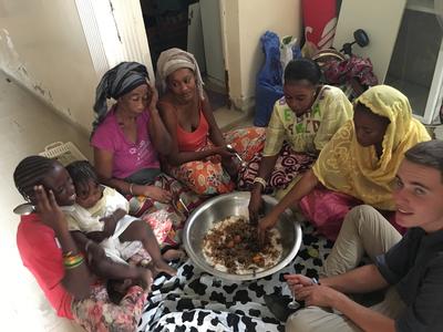Noah sharing a meal with his host family Noah sharing a meal with his host family