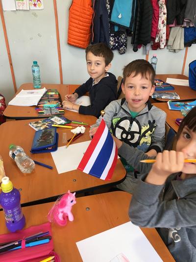 Students drawing and colouring in flags on a volunteer Teaching Project in Romania Students drawing and colouring in flags on a volunteer Teaching Project in Romania
