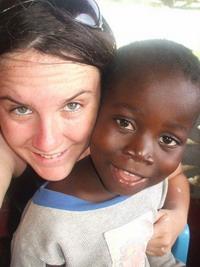 With child at orphanage With child at orphanage