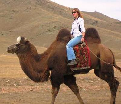 Riding a camel Riding a camel