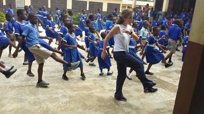 Sara leading a dance class with students Sara leading a dance class with students