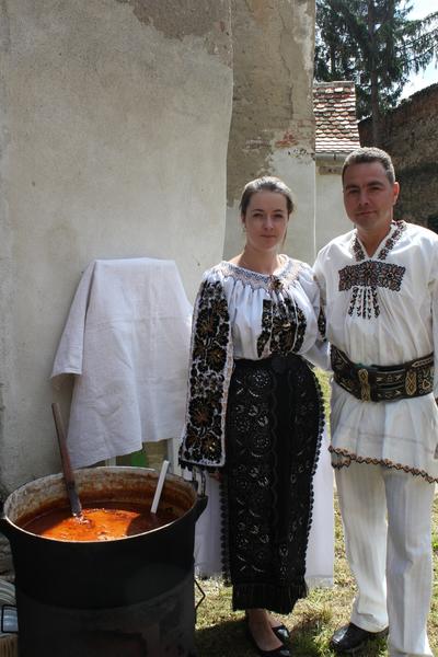 Local Romanian people making stew Local Romanian people making stew