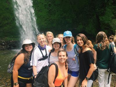 Volunteers at Mount Meru waterfall in Tanzania Volunteers at Mount Meru waterfall in Tanzania