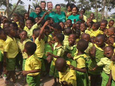 Public Health volunteers working with children in Ghana Public Health volunteers working with children in Ghana