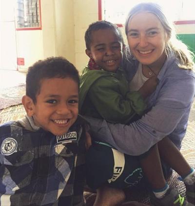 Volunteer with children from her kindergarten placement Volunteer with children from her kindergarten placement